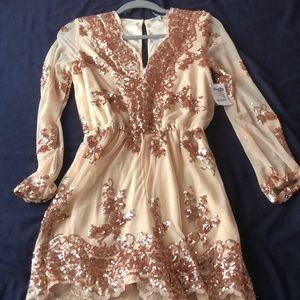 Gold,champagne romper with rose gold sparkles.